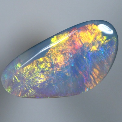 SOLID SEMI BLACK OPAL Bright orange and green roll over blue